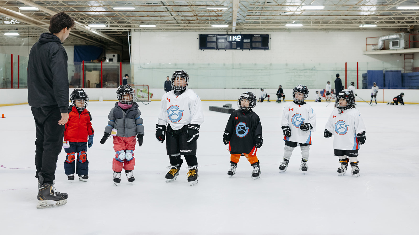 Active kids in summer sports like hockey and skating camps in Canada for better health and school performance